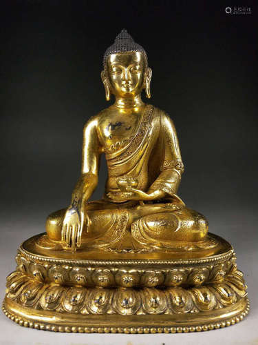 A GILT BRONZE FIGURE OF BUDDHA