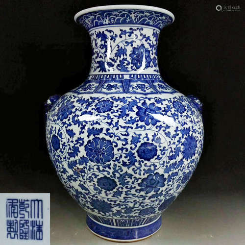 A BLUE AND WHITE VASE WITH QIANLONG MARK