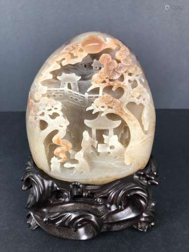 A Hetian Jade Mountain carving with stand