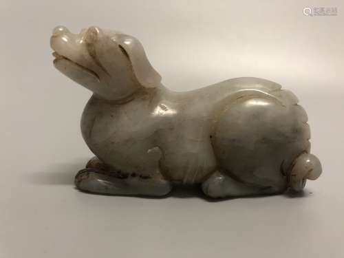 A JADE CARVING OF DOG