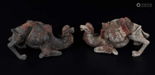 A PAIR OF POTTERY CAMELS