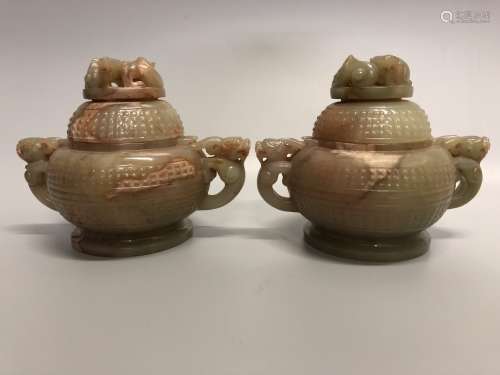 A PAIR OF CARVED GO CONTAINERS