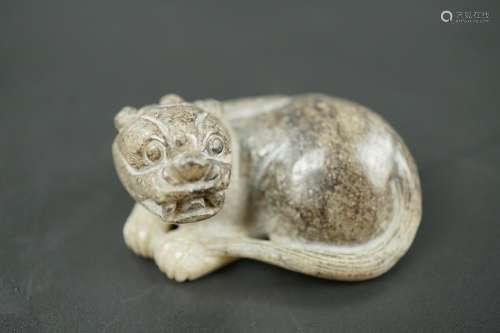 A JADE CARVED ORNAMENT OF TIGER