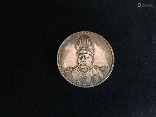 A SILVER COIN