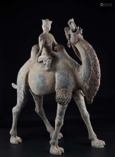 A BRONZE CAMEL AND MAN