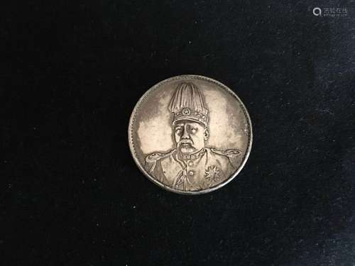 A SILVER COIN