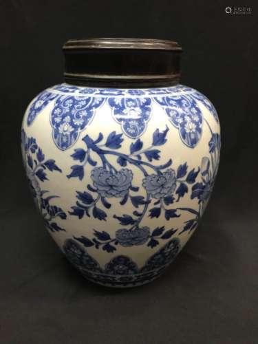 A BLUE AND WHITE JAR AND COVER