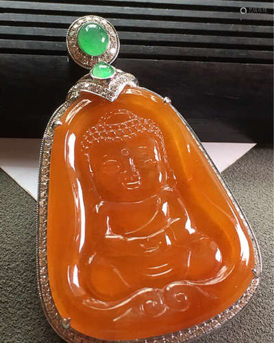 A NATURAL ICY BUDDHA JADEITE PENDANT