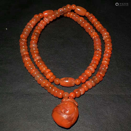 AN OLD RED AGATE NECKLACE