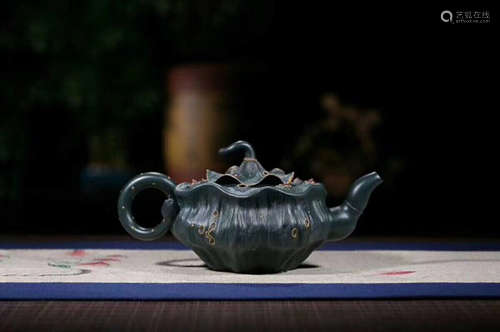 A WENCHENG POTTERY LOTUS SEEDPOD SHAPED CLAY TEAPOT