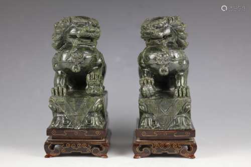 A Pair of carved Green-Jade lions