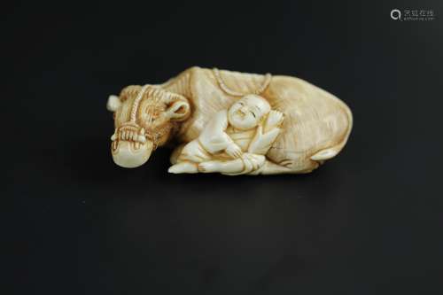 Japanese Netsuke carving of a boy and his ox