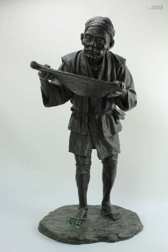 Bronze figure of a Japanese man by Kanejiro Kaneda