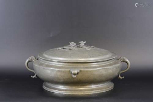 A Carved Dragon Pewter Steamer from the 19th Century