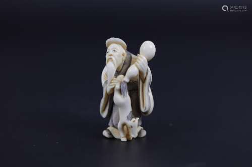 A Carved Netsuke of Jurojin, One of the Seven Lucky