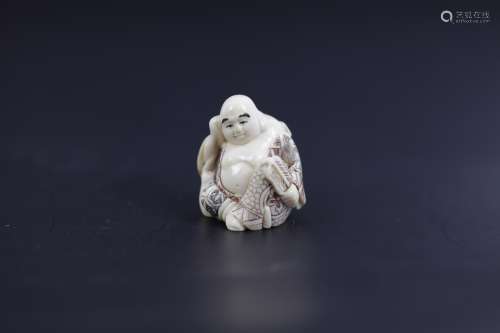 A Carved Netsuke of Two Men Drinking Signed