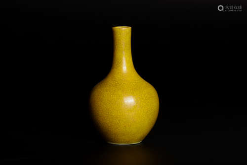 A yellow glaze bottle