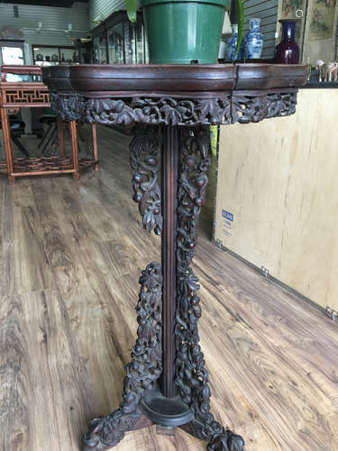 A chinese wood incense table