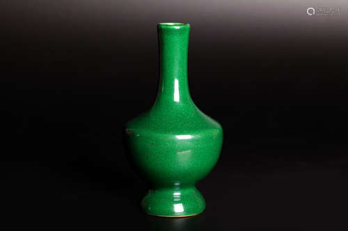 A green glaze bottle