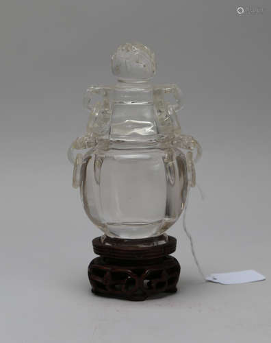 Qing dynasty crystal bottle with wooden pallet