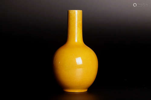 A 18c yellow glaze bottle