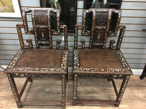 A pair of rosewood chair