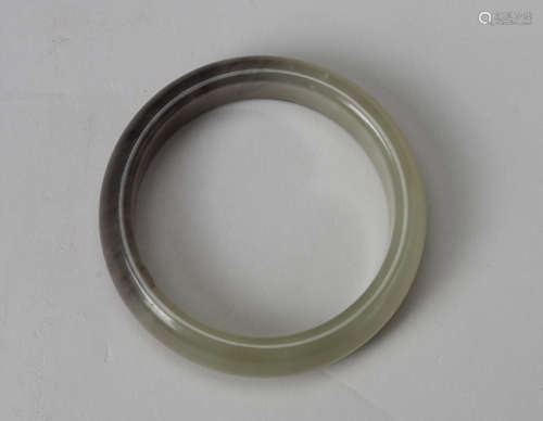 Hetian jade bracelet with a section has a violet color