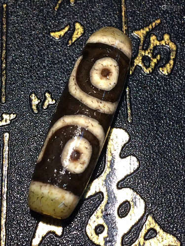 A THREE-EYE DZI BEAD