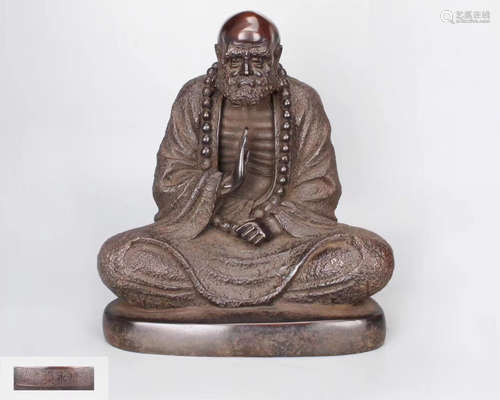 A BRONZE CARVED BUDDHA FIGURE WITH YONGLE MARK