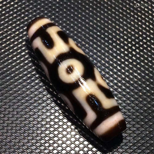 A SEVEN-EYE DZI BEAD