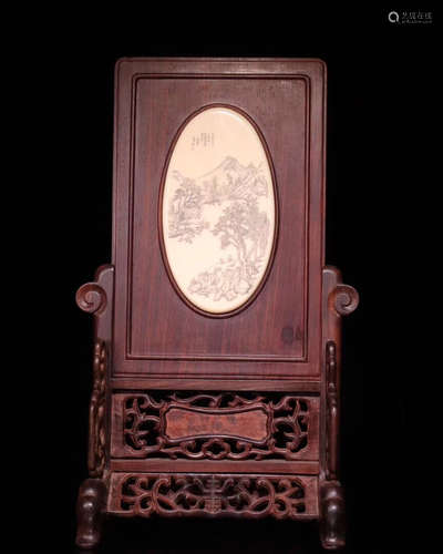 A RED ROSEWOOD CARVED SCREEN