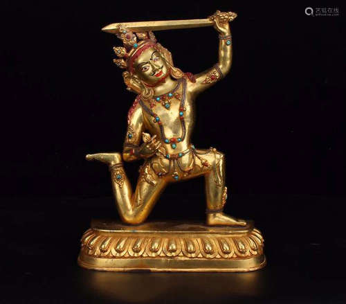 A GILT BRONZE CARVED BUDDHA FIGURE