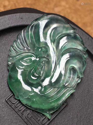 A NATURAL JADEITE PHOENIX FIGURE