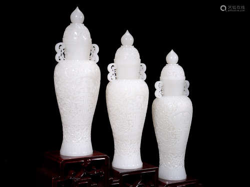 THREE HETIAN JADE CARVED BOTTLE VASES