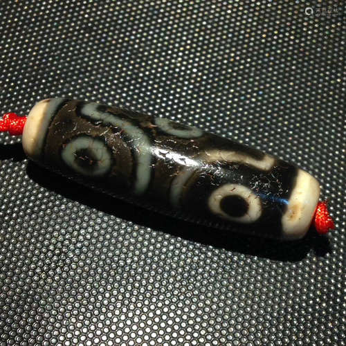 A SIX-EYE DZI BEAD