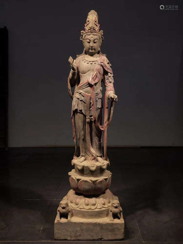 A STONE CARVED BUDDHA FIGURE