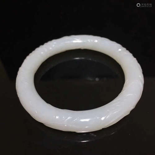 A WHITE JADE BANGLE