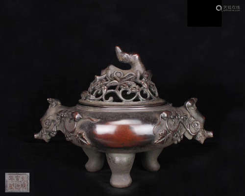 A BRONZE CARVED TRIPOD CENSER WITH XUANDE MARK