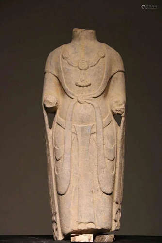 A STONE CARVED BUDDHA FIGURE