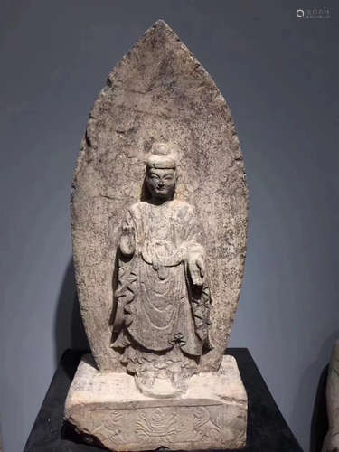 A STONE CARVED BUDDHA FIGURE