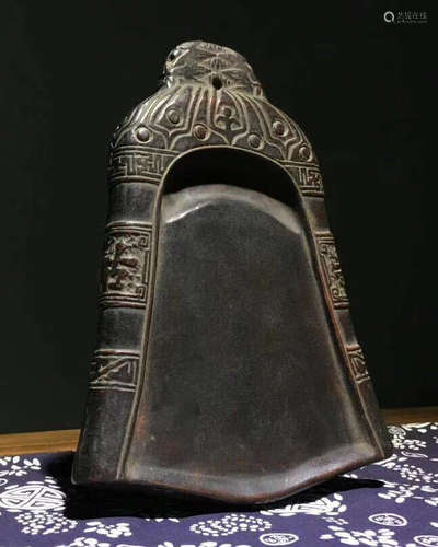 A TEMPLE BELL SHAPED INK SLAB