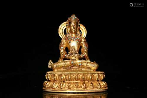 A Gilt Bronze Guanyin Sculpture