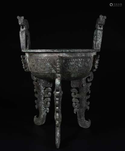 A Bronze Tripod Vessel