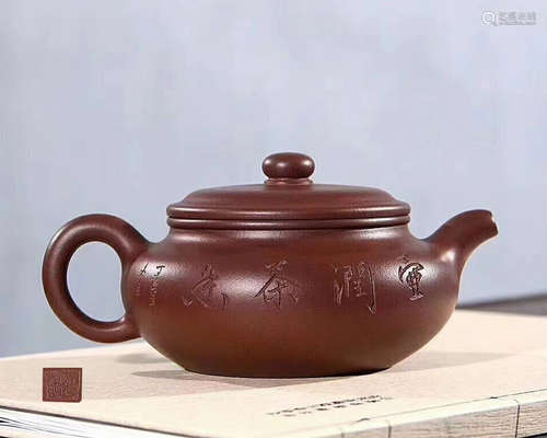 A YUXING ZISHA TEAPOT WITH ZHOUGUOFANG MARK