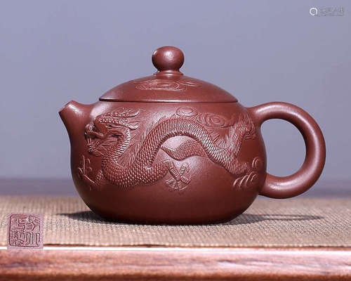 A DRAGON DECORATED YUXING ZISHA TEAPOT WITH MAXIAOPING MARK