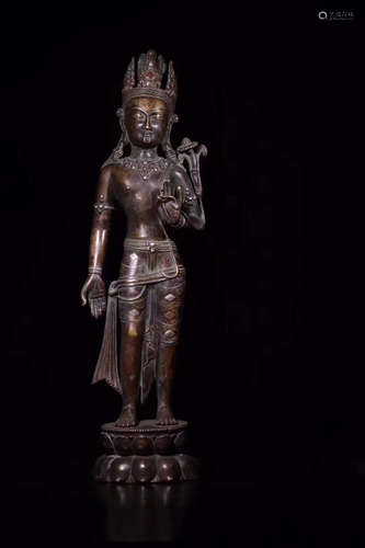 A BRONZE GUANYIN FIGURE