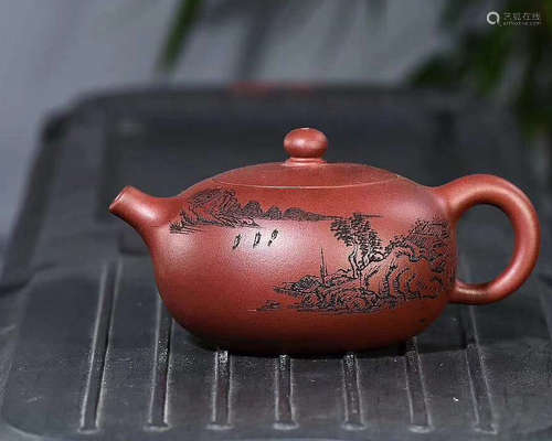 A YUXING ZISHA TEAPOT WITH ZHANGYI MARK