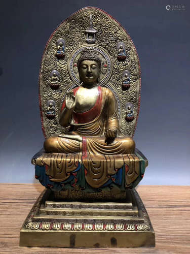 A GLITED BUDDHA FIGURE