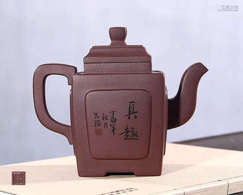 A SQUARE YUXING ZISHA TEAPOT WITH ZHOUGOUFANG MARK