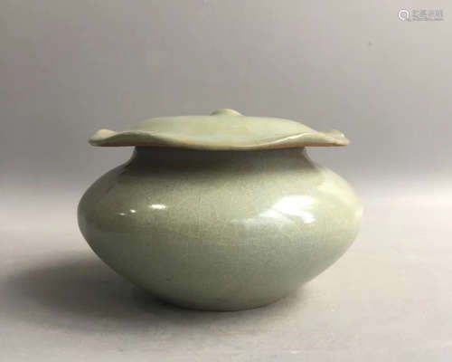 A LOTUS SHAPED COVER JAR